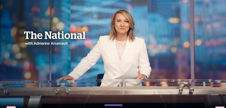 Live news broadcast studio with presenter at anchor desk